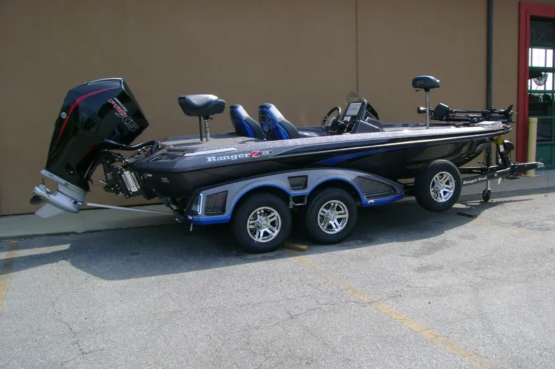 Slide: The Image of 2026 Ranger Z519R Cup-Equipped boat on trailer, featuring sleek design and powerful engine. - 2