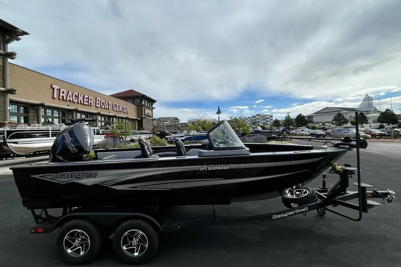 Slide: The Image of 2026 Ranger VX1888 WT boat at Tracker Boat Center, parked on a trailer. - 3