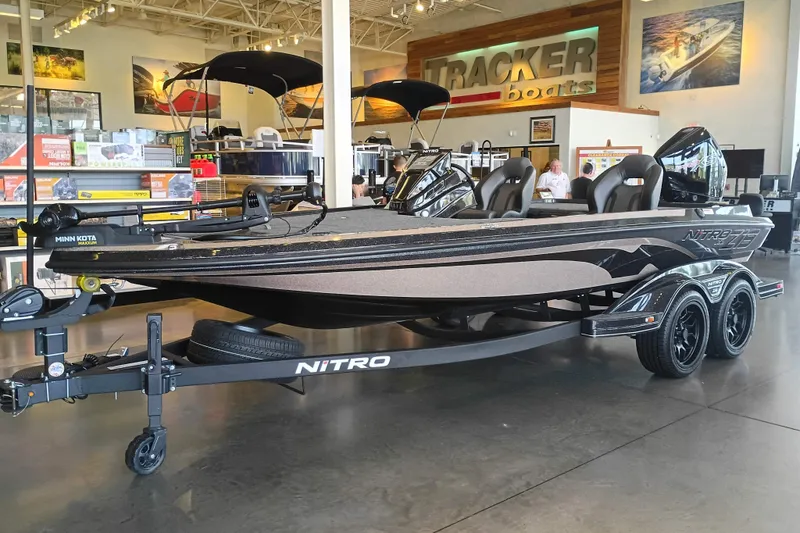 The Image of 2026 Nitro Z19 XL boat displayed in showroom with Tracker Boats signage. - 0