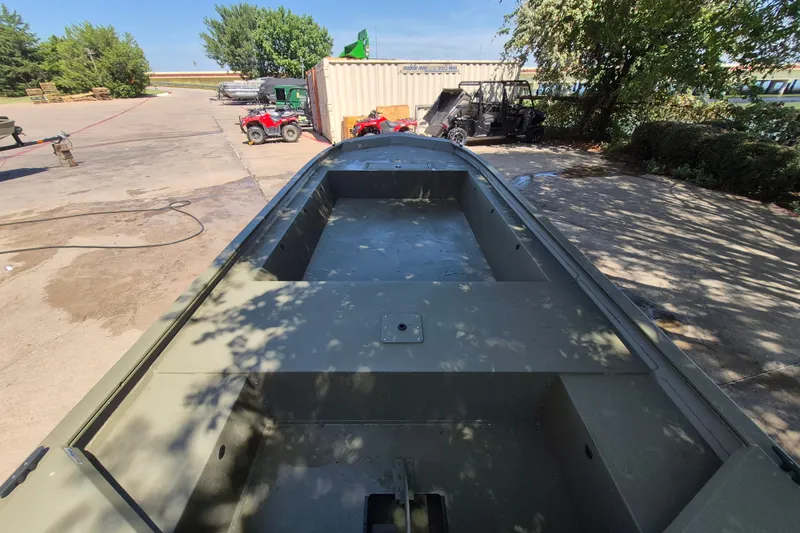 Slide: The Image of 2026 Tracker Grizzly 1754 Utility boat in outdoor setting, showcasing spacious interior design. - 8