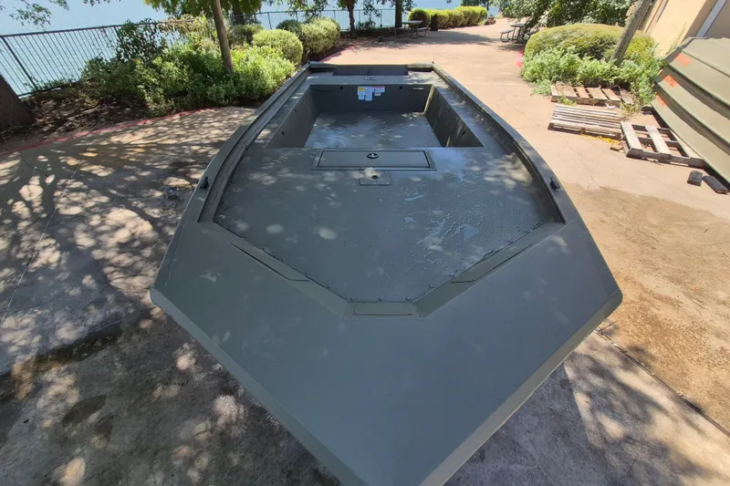 Slide: The Image of 2026 Tracker Grizzly 1754 Utility boat on a sunny outdoor setting. - 9