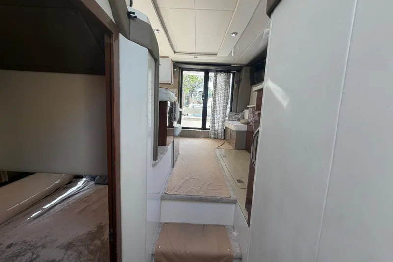Slide: The Image of Interior view of 2015 Carver 40 Command Bridge yacht, featuring modern design and spacious layout. - 42