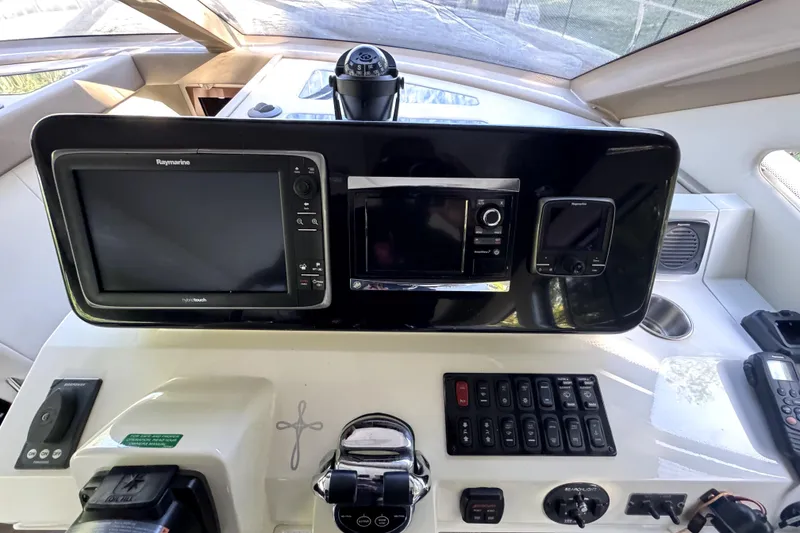Slide: The Image of 2015 Carver 40 Command Bridge helm with navigation systems. - 6