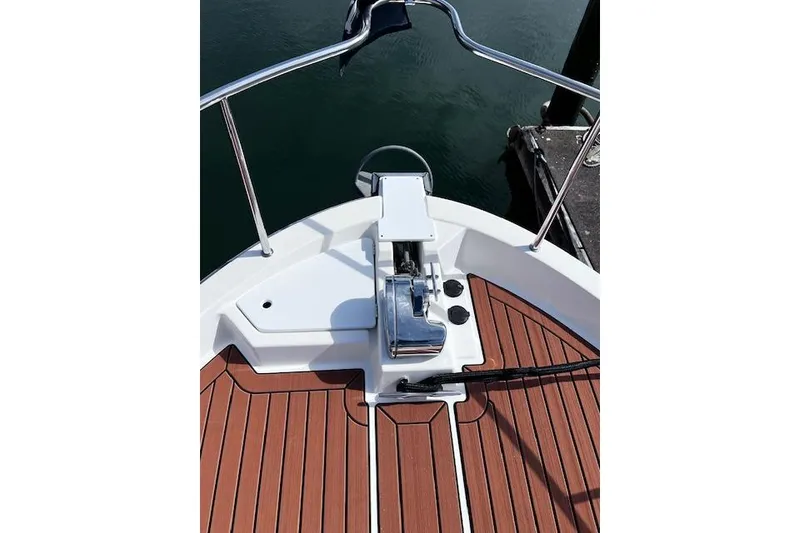 Slide: The Image of Bow of 2021 Ranger Tugs R-31 CB with teak deck and anchor system. - 23