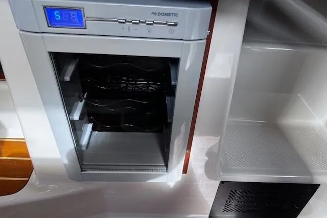 Slide: The Image of Dometic refrigerator in 2021 Ranger Tugs R-31 CB boat interior. - 49