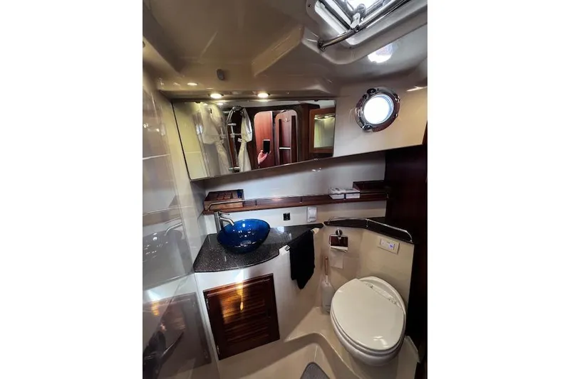 Slide: The Image of Luxurious bathroom interior of 2021 Ranger Tugs R-31 CB boat with modern fixtures. - 57