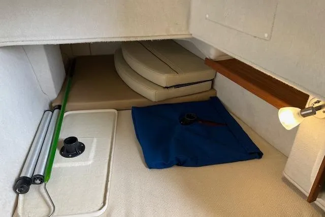 Slide: The Image of Interior cabin of 2021 Ranger Tugs R-31 CB with storage and seating area. - 59