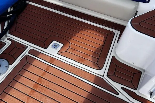 Slide: The Image of 2021 Ranger Tugs R-31 CB boat deck with teak-style flooring. - 62