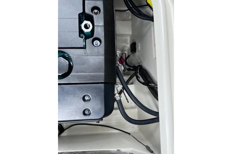 Slide: The Image of Engine compartment of 2021 Ranger Tugs R-31 CB with visible wiring and components. - 69