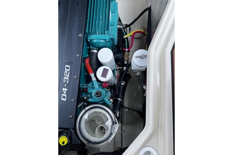 Slide: The Image of Engine compartment of 2021 Ranger Tugs R-31 CB with D4-320 engine components. - 70
