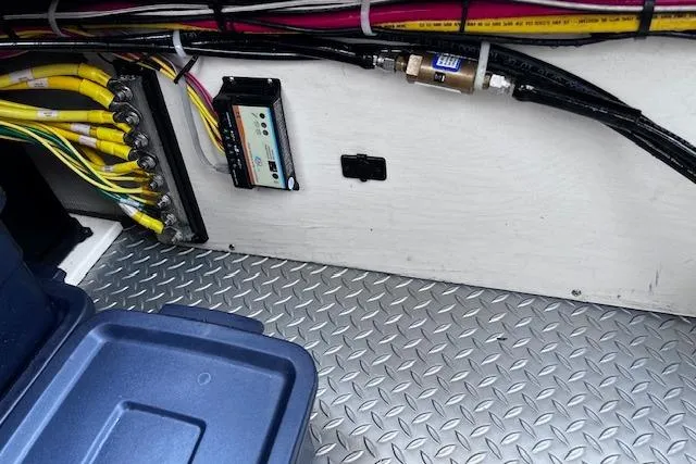 Slide: The Image of Electrical wiring and components inside a 2021 Ranger Tugs R-31 CB boat. - 73