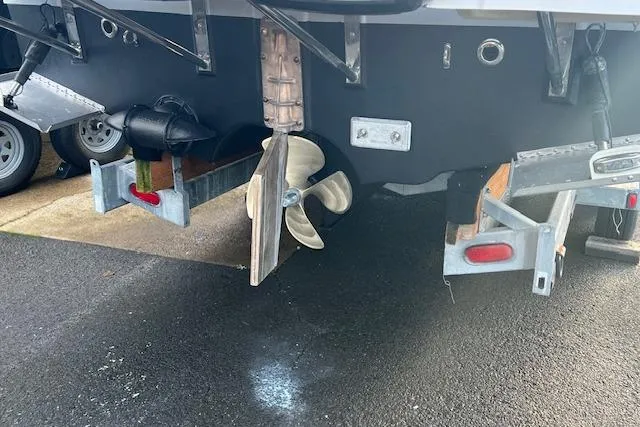 Slide: The Image of 2021 Ranger Tugs R-31 CB boat propeller and rudder on a trailer. - 77