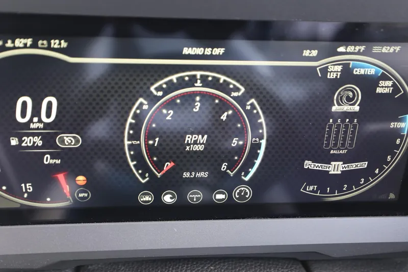 Slide: The Image of 2023 Malibu Wakesetter 22 LSV dashboard displaying RPM, speed, and surf settings. - 10