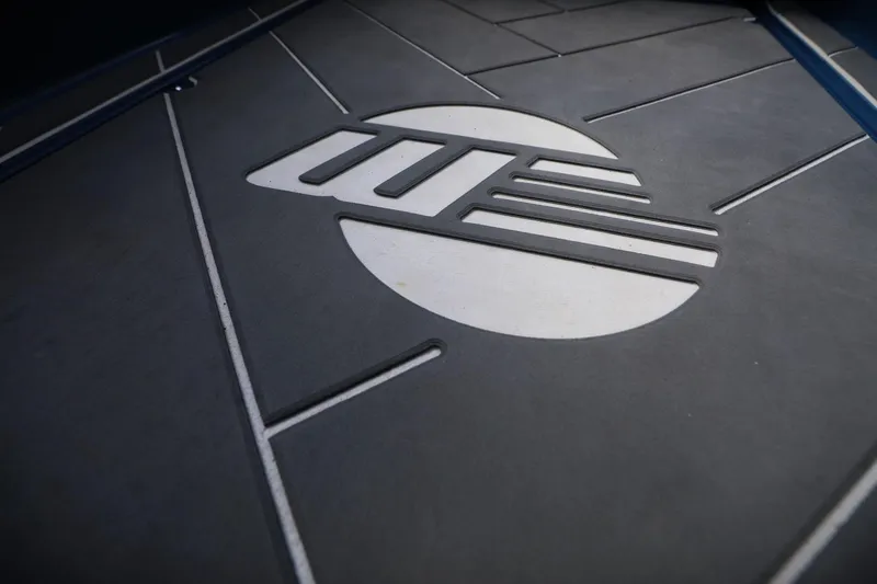 Slide: The Image of Close-up of 2023 Malibu Wakesetter 22 LSV logo on sleek surface. - 3
