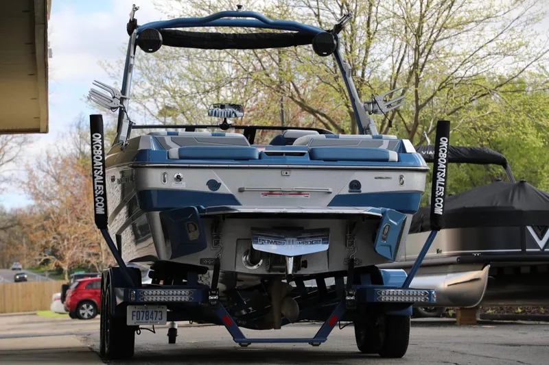 Slide: The Image of 2023 Malibu Wakesetter 22 LSV boat on trailer, rear view, outdoors. - 4