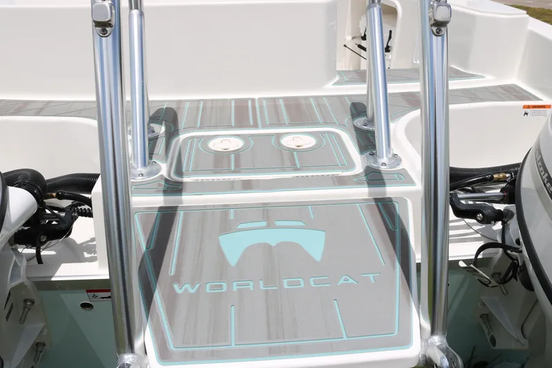 Slide: The Image of 2026 World Cat 230 SD boat deck with logo and sleek design elements. - 14
