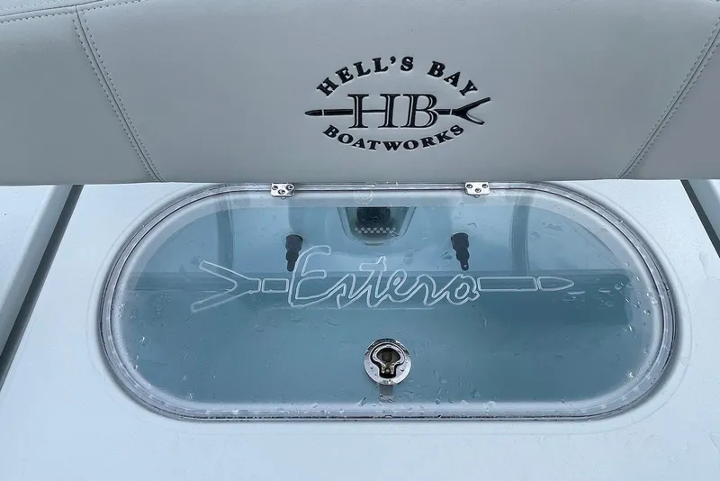 Slide: The Image of 2025 Hell's Bay Estero boat livewell with logo and branding details. - 13