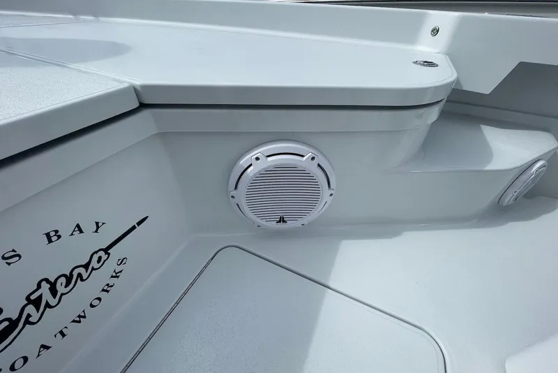 Slide: The Image of 2025 Hell's Bay Estero boat interior with speaker and logo detail. - 20