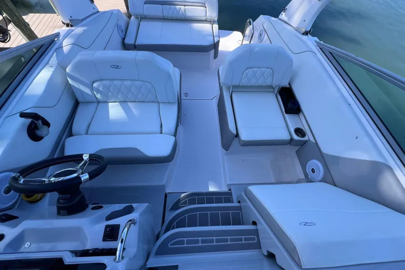 Slide: The Image of Interior of a 2020 Regal 26 XO boat with white seating. - 33