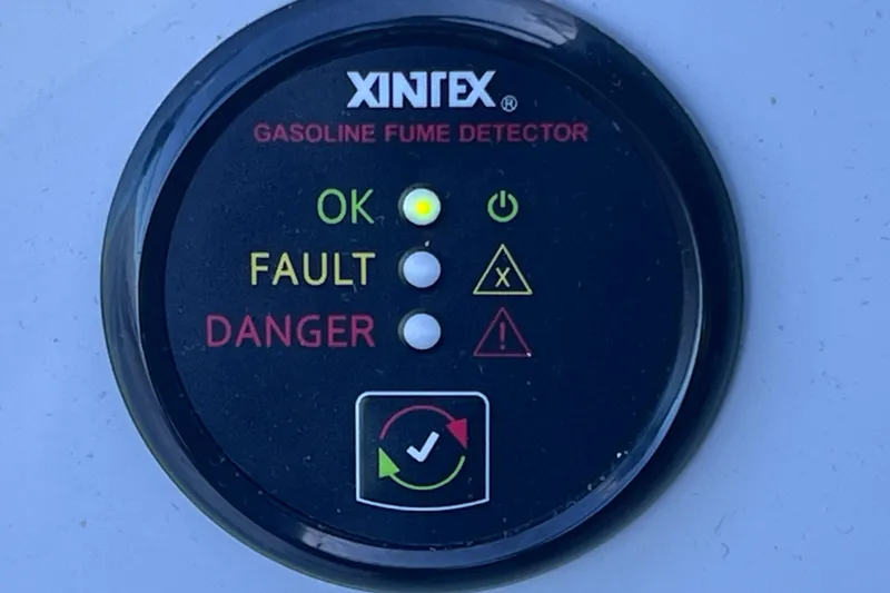 Slide: The Image of Gasoline fume detector on 2020 Regal 26 XO boat, showing status indicators. - 38