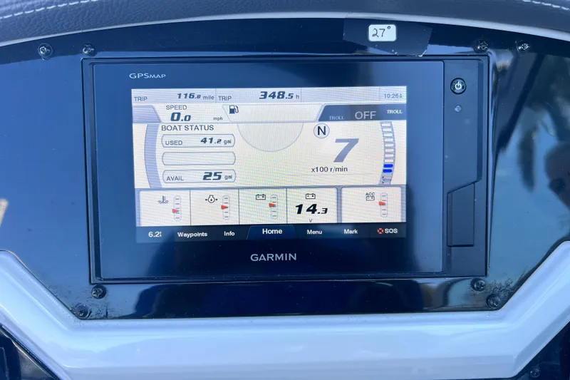 Slide: The Image of Garmin GPS display on 2020 Regal 26 XO boat dashboard showing trip and fuel data. - 39