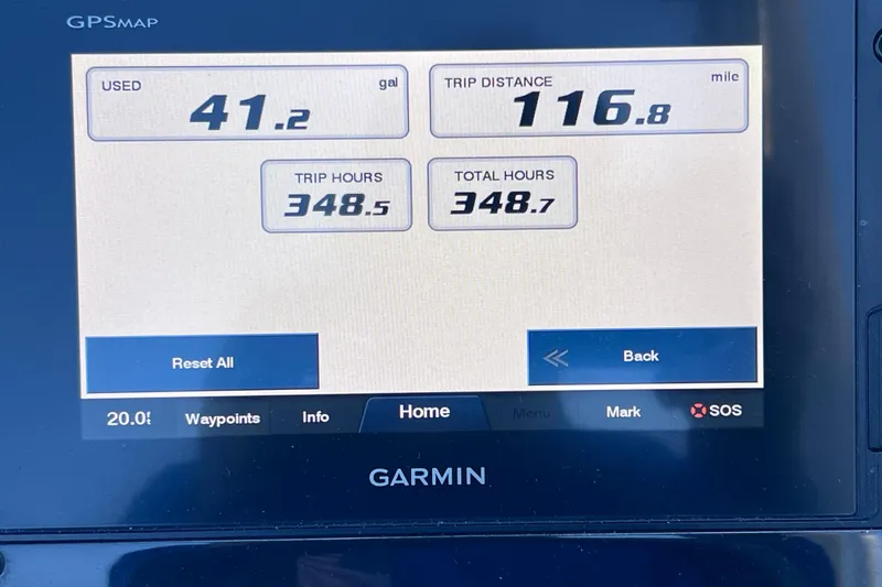 Slide: The Image of Garmin GPS display showing fuel usage, trip distance, and hours for 2020 Regal 26 XO boat. - 40