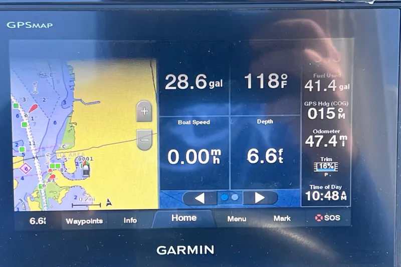 Slide: The Image of Garmin GPS display on a 2020 Regal 26 XO boat showing navigation and fuel data. - 41