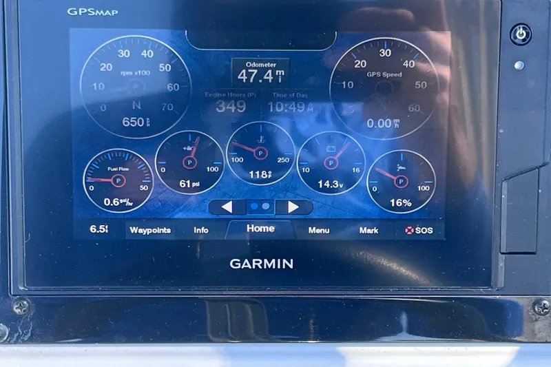 Slide: The Image of Garmin GPS display on 2020 Regal 26 XO boat showing engine metrics and navigation data. - 42