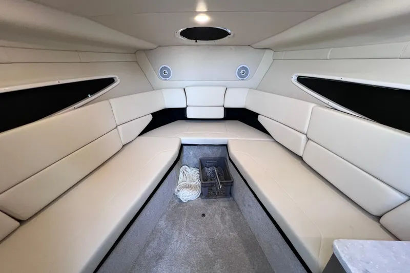 Slide: The Image of Interior of a 2020 Regal 26 XO boat with beige seating and modern design. - 46