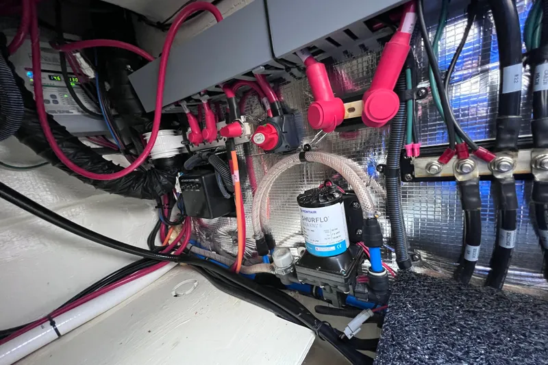 Slide: The Image of Electrical and plumbing systems inside a 2020 Regal 26 XO boat. - 58