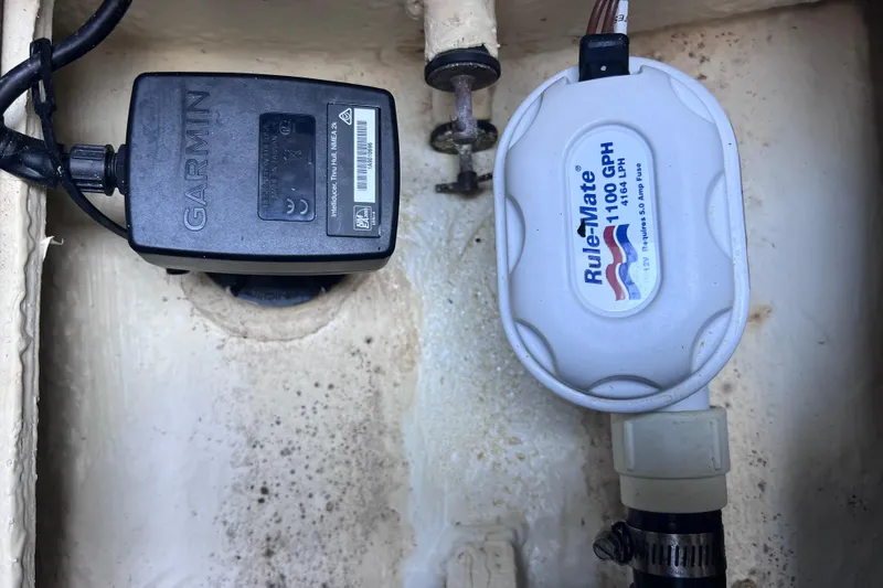 Slide: The Image of Garmin and Rule-Mate devices installed on a 2020 Regal 26 XO boat. - 61