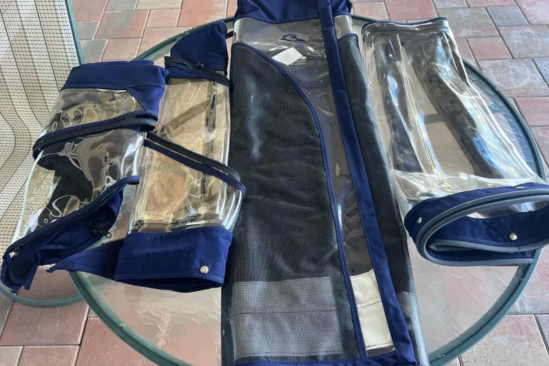 Slide: The Image of Clear vinyl boat enclosure panels for 2020 Regal 26 XO on a glass table. - 65