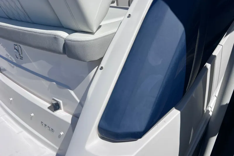 Slide: The Image of 2020 Regal 26 XO boat, featuring sleek white and blue design with comfortable seating. - 69