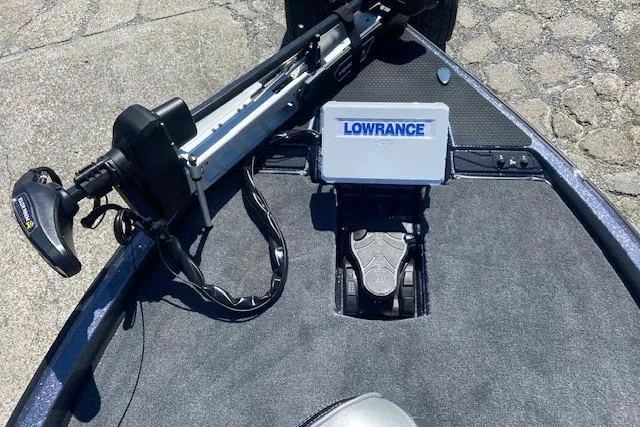 Slide: The Image of Phoenix 721 ZXL 2026 boat deck with Lowrance fishfinder and trolling motor. - 4