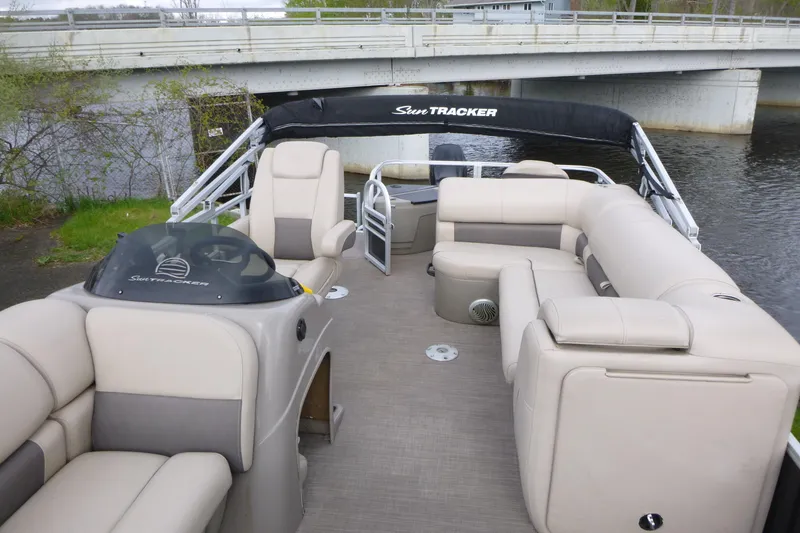 Slide: The Image of 2021 Sun Tracker Fishin' Barge 20 DLX pontoon boat with spacious seating and helm. - 7