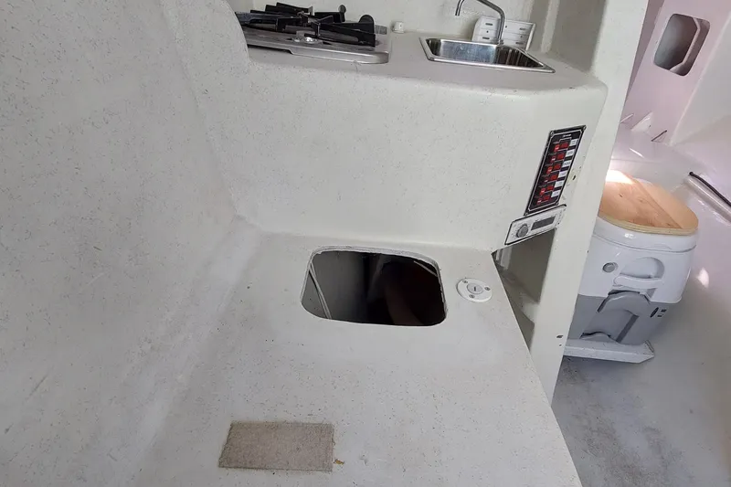 Slide: The Image of Interior of a 2007 Farrier F-82R sailboat with ropes and equipment. - 12