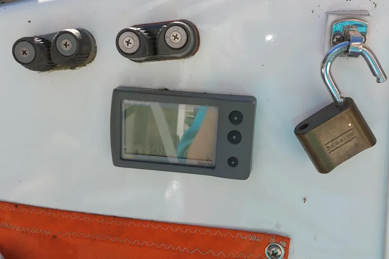 Slide: The Image of Interior of a 2007 Farrier F-82R sailboat with compact kitchen and seating area. - 15