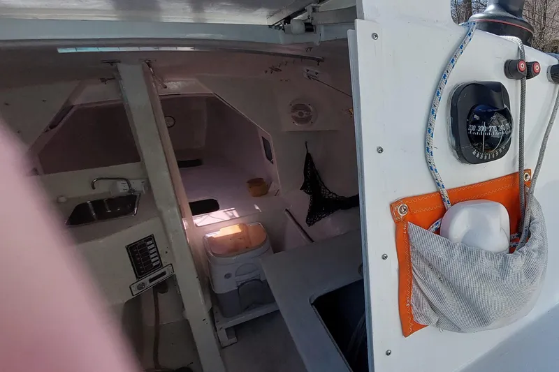 Slide: The Image of Compact boat interior with kitchenette and toilet, Farrier F-82R, 2007 model. - 16