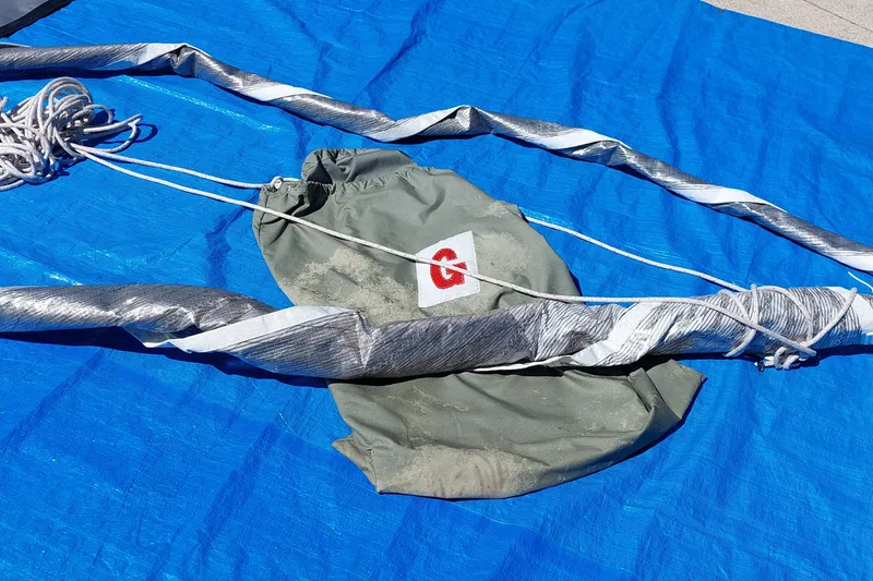 Slide: The Image of Coiled Farrier F-82R parachute in green bag, 2007 model. - 24