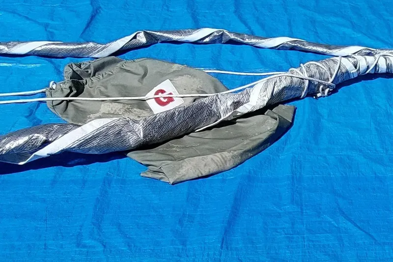 Slide: The Image of Coiled rope on blue tarp, Farrier F-82R, 2007 model. - 28