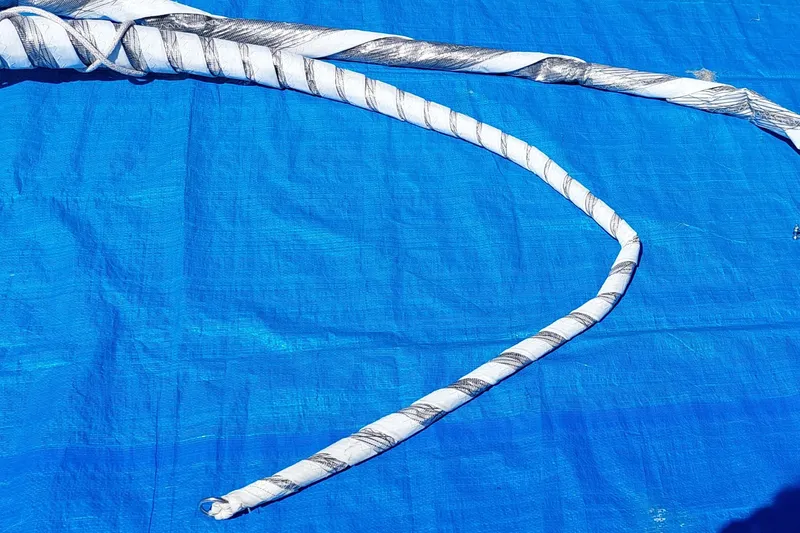 Slide: The Image of Coiled rope on blue tarp, Farrier F-82R, 2007 model. - 29