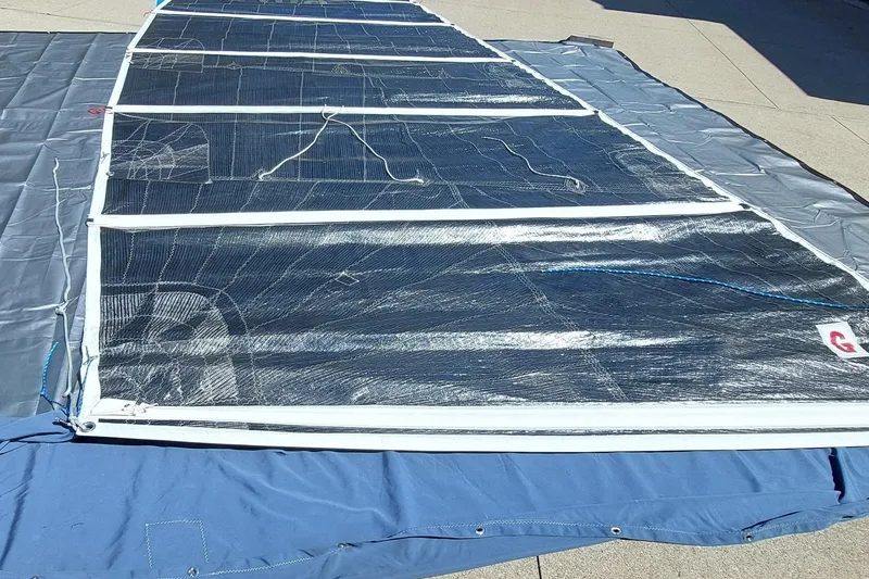 Slide: The Image of Blue fabric cover with metal fasteners, Farrier F-82R model, 2007. - 31