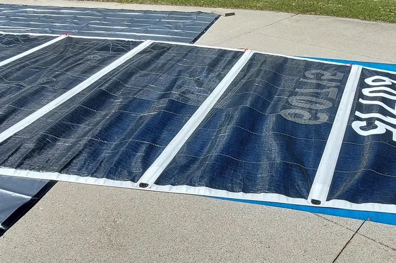 Slide: The Image of Large sail laid out on pavement, Farrier F-82R, 2007 model. - 36