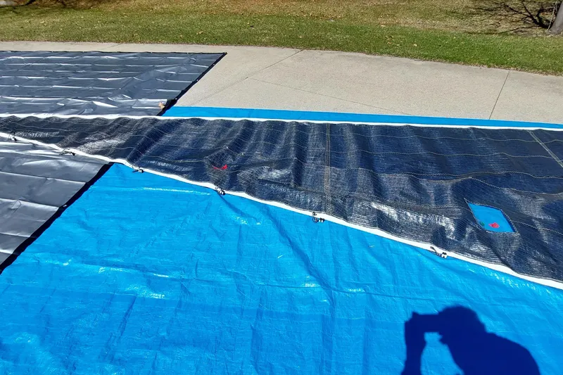 Slide: The Image of Red rope and black device on blue tarp, Farrier F-82R, 2007 model. - 51