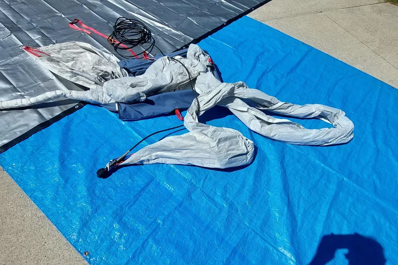 Slide: The Image of Unfolded parachute on blue tarp, Farrier F-82R model, 2007. - 54