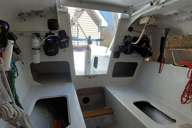 Slide: The Image of Interior of a 2007 Farrier F-82R sailboat cabin with compact amenities. - 9