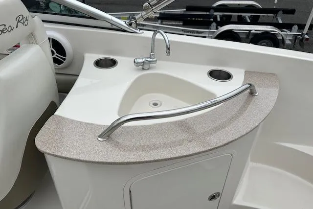 The Image of 2007 Sea Ray 260 Sundeck boat interior with sink and countertop. - 1