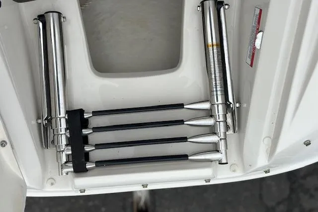 Slide: The Image of 2007 Sea Ray 260 Sundeck boat ladder and hydraulic components in storage compartment. - 14