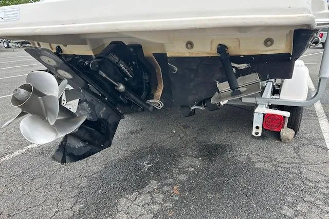 Slide: The Image of Rear view of a 2007 Sea Ray 260 Sundeck boat on a trailer, showing the propeller and outdrive. - 24