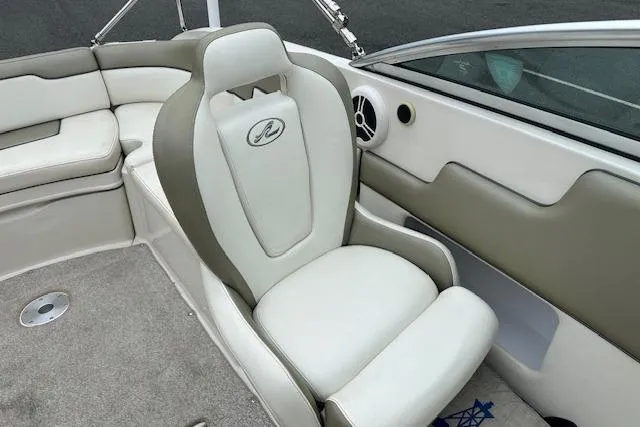 Slide: The Image of 2007 Sea Ray 260 Sundeck interior with plush seating and modern design. - 3